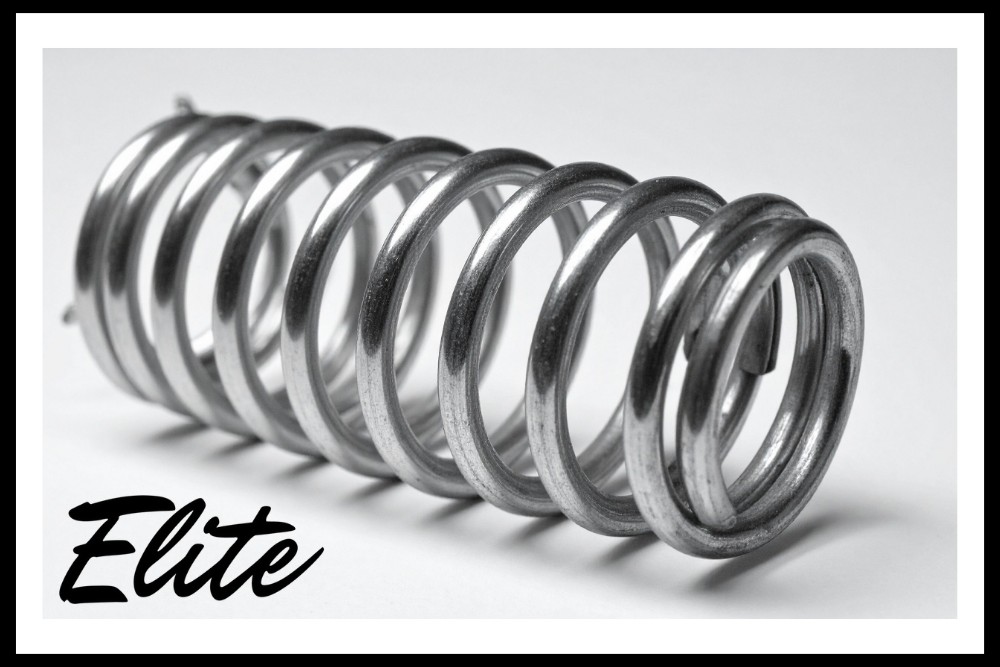 The Complete Guide to Garage Door Springs and How to Care for Them-1 Elite Garage Door Services of Northwest Arkansas-A close-up of a shiny metal garage door spring with the text "Elite" in black script, representing professional garage door repair services in Northwest Arkansas.