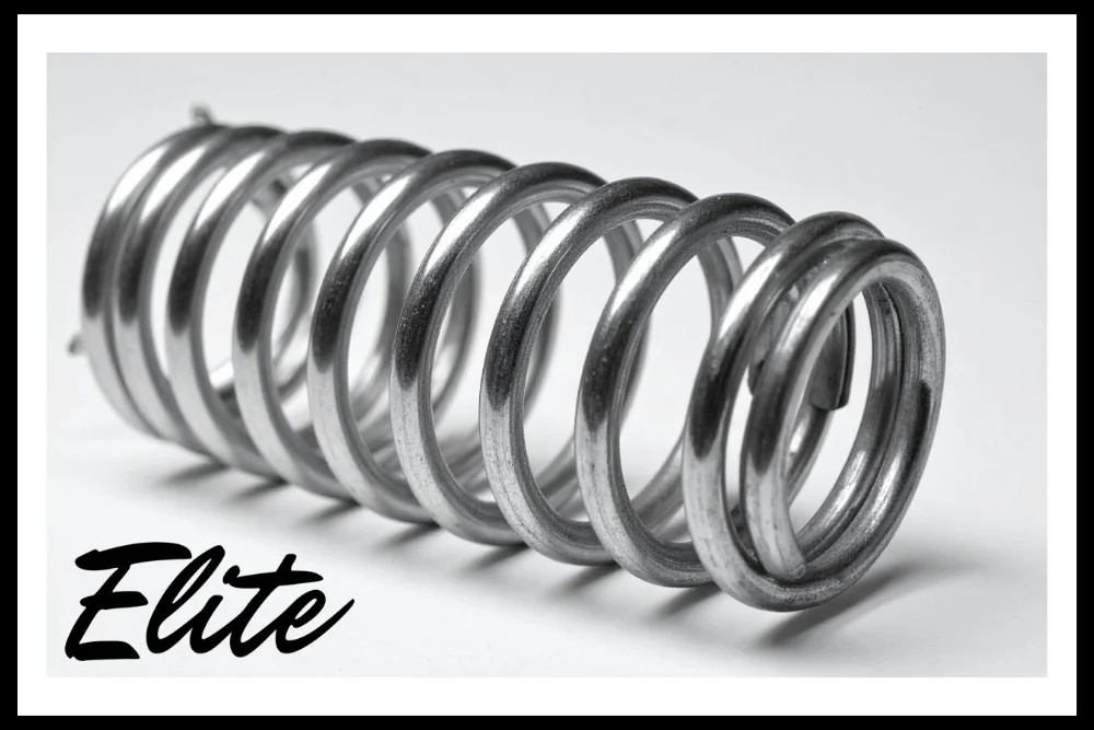 The Complete Guide to Garage Door Springs and How to Care for Them-1 Elite Garage Door Services of Northwest Arkansas-A close-up of a shiny metal garage door spring with the text "Elite" in black script, representing professional garage door repair services in Northwest Arkansas.