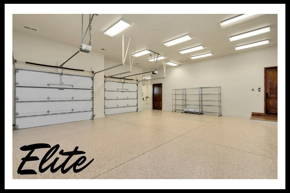 Why Regular Garage Door Tune-Ups Save You Money-3 Elite Garage Door Services of Northwest Arkansas-A spacious, well-lit garage with two overhead garage doors and clean flooring, suitable for residential use in Northwest Arkansas. Elite Garage Door offers professional and reliable garage door service and installation in this area.