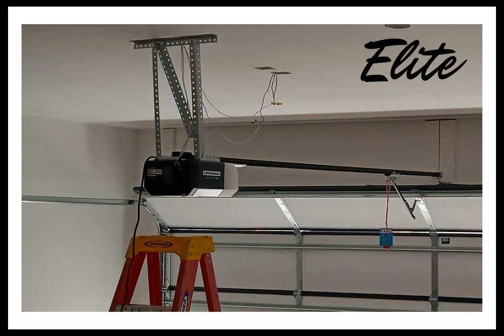 What-Is-the-Average-Cost-to-Fix-a-Garage-Door-Opener-2 Garage door opener motor and circuit board being inspected for repair cost in Northwest Arkansas