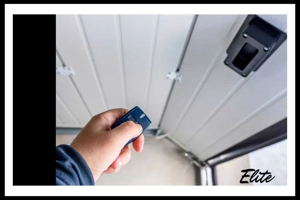 What-Is-the-Average-Cost-to-Fix-a-Garage-Door-Opener-4 Elite Garage Door team giving an upfront garage door opener repair quote in Northwest Arkansas